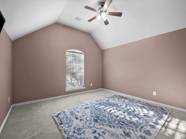 bonus room featuring ceiling fan, light colored carpet, and vaulted ceiling