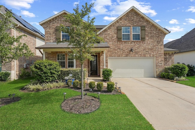 view of front facade featuring a garage and a front lawn