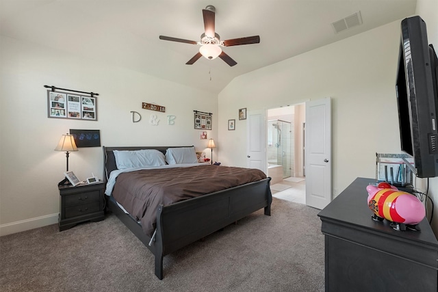 carpeted bedroom with ceiling fan, connected bathroom, and vaulted ceiling