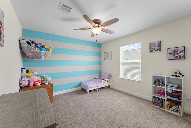 carpeted bedroom with ceiling fan