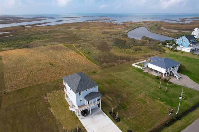 bird's eye view featuring a water view and a rural view