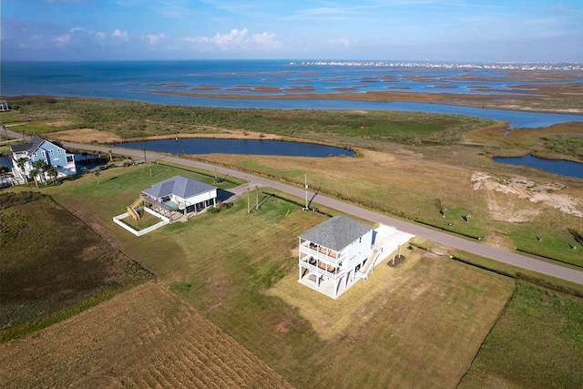 bird's eye view featuring a rural view and a water view