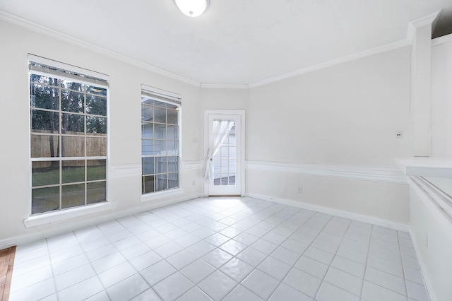 unfurnished room featuring crown molding and light tile patterned floors