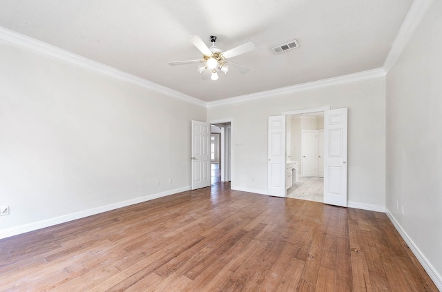 unfurnished bedroom with light hardwood / wood-style flooring, ceiling fan, and crown molding