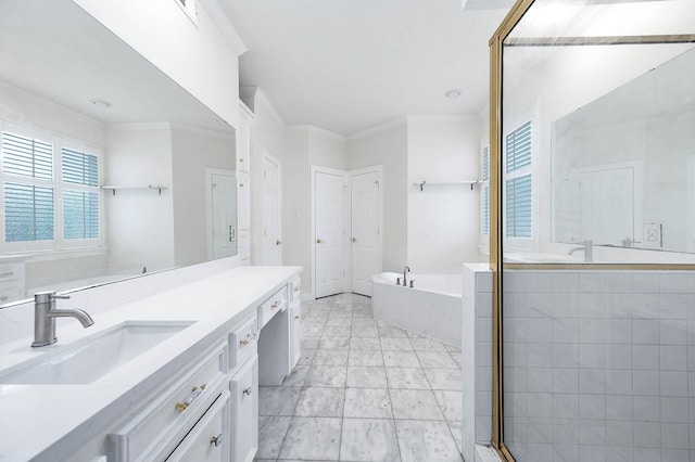 bathroom featuring plus walk in shower, vanity, and ornamental molding