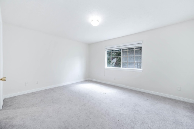 empty room with carpet flooring