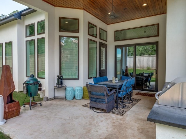 view of patio with a grill