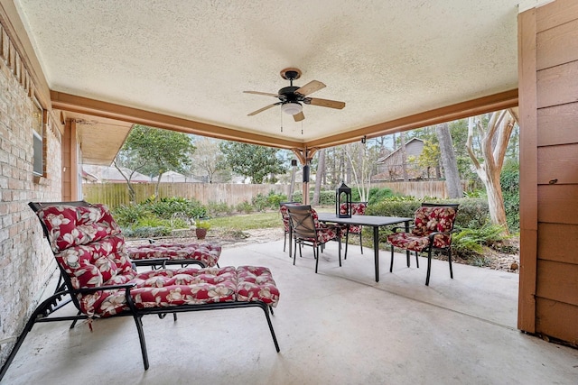 view of patio / terrace featuring ceiling fan