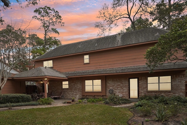 exterior space with a yard and a patio