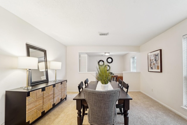 view of carpeted dining room