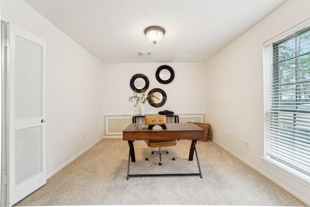 view of carpeted home office