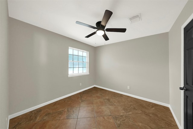 empty room featuring ceiling fan