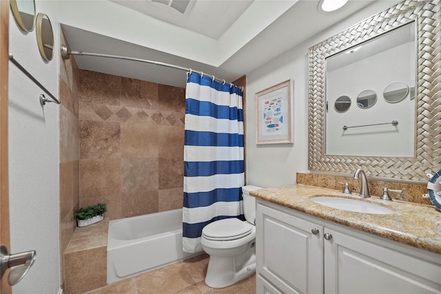 full bathroom featuring tile patterned floors, vanity, shower / bath combination with curtain, and toilet