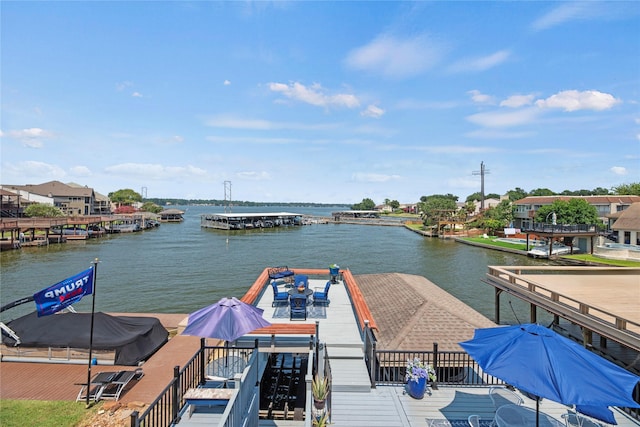 dock area featuring a water view