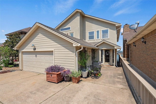 view of front of property with a garage