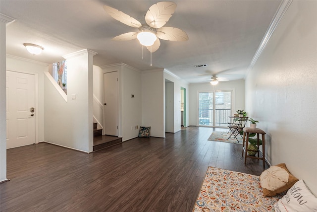 interior space featuring ceiling fan, dark hardwood / wood-style floors, and ornamental molding