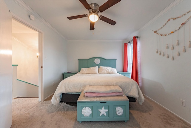 bedroom featuring ceiling fan, ornamental molding, and light carpet