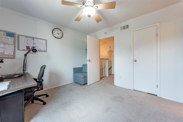 home office with ceiling fan, crown molding, and light carpet