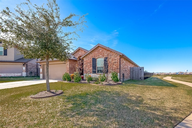 view of front of property featuring a front lawn and a garage