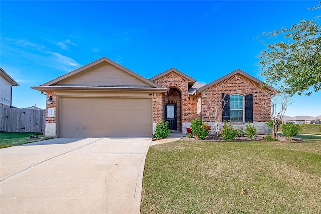 ranch-style home featuring a front yard and a garage