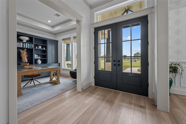 foyer with french doors and a wealth of natural light