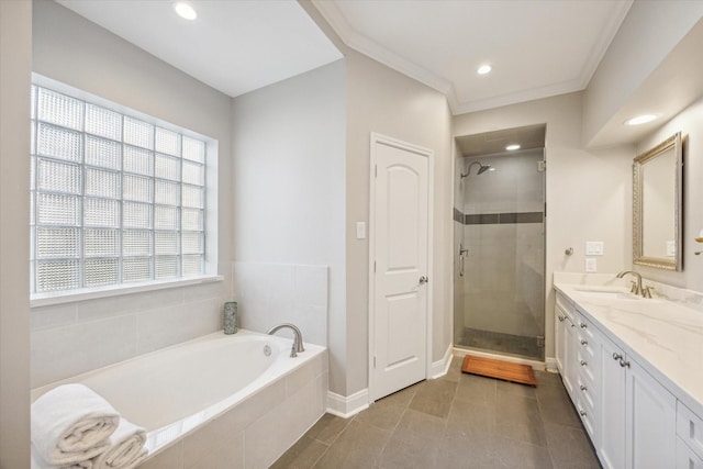 bathroom with ornamental molding, vanity, tile patterned floors, and independent shower and bath