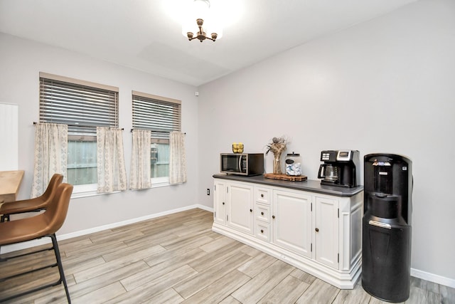 bar with white cabinetry