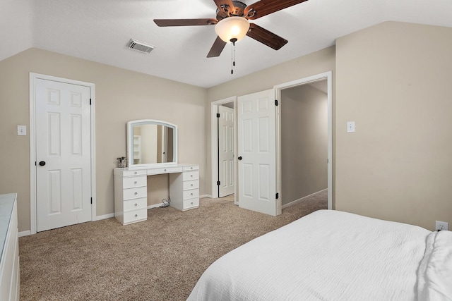 bedroom featuring light carpet, ceiling fan, and lofted ceiling