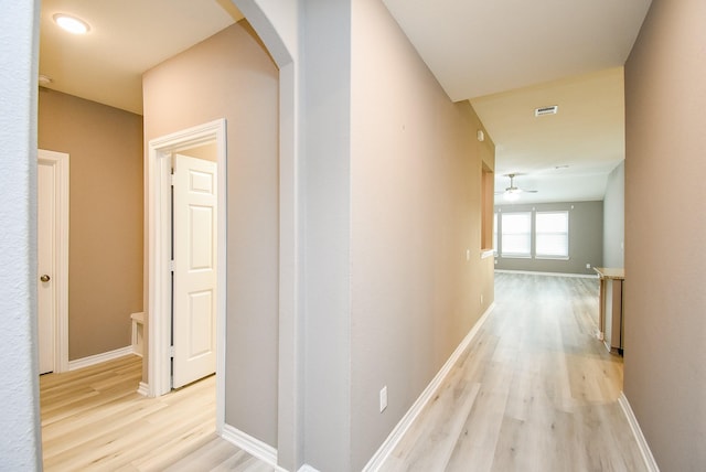 hallway featuring light hardwood / wood-style floors