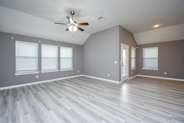 unfurnished living room with light hardwood / wood-style floors, ceiling fan, and lofted ceiling