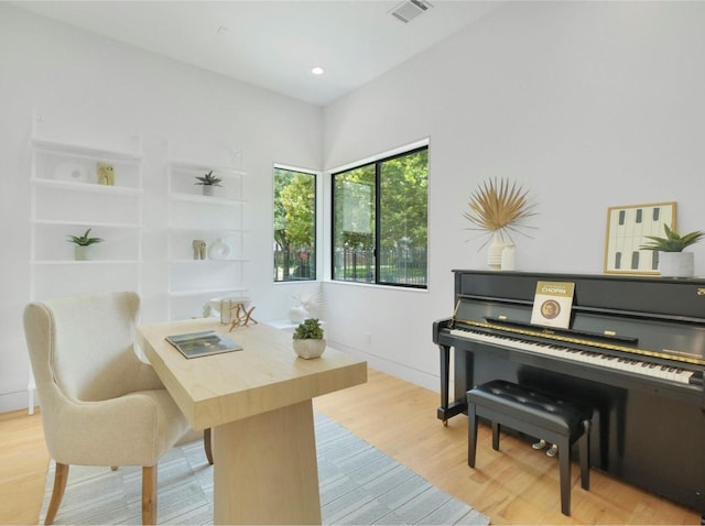 misc room with light hardwood / wood-style floors