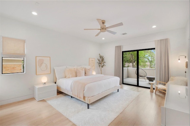 bedroom featuring access to outside, ceiling fan, and light hardwood / wood-style floors