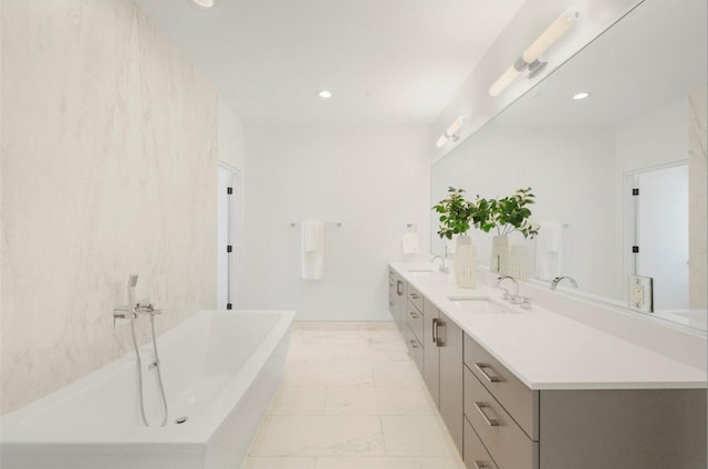 bathroom featuring vanity and a bathing tub