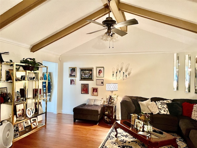 living room with hardwood / wood-style floors, lofted ceiling with beams, and ceiling fan