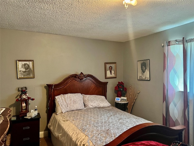 bedroom featuring a textured ceiling