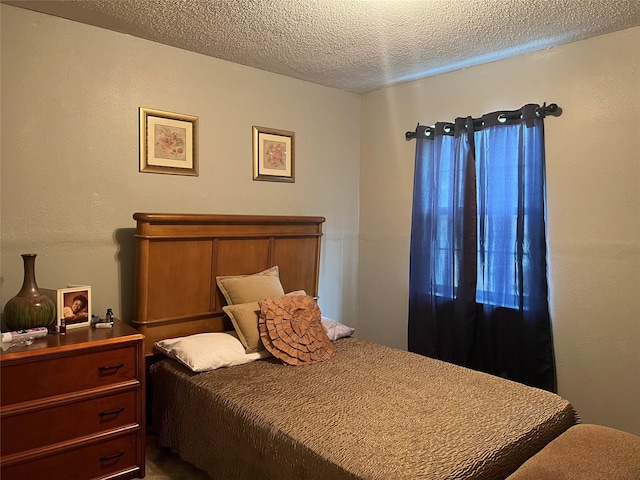 bedroom with a textured ceiling