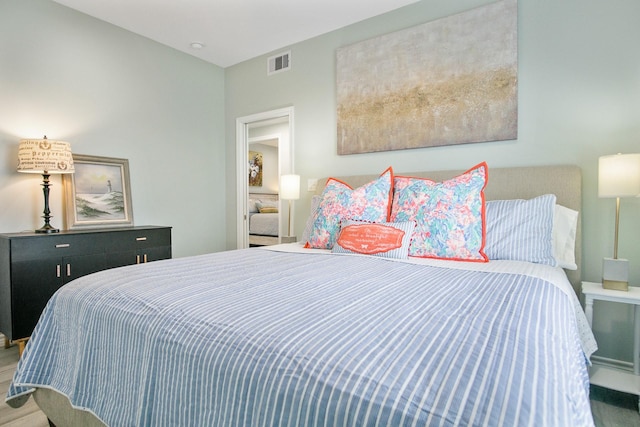 bedroom featuring wood-type flooring