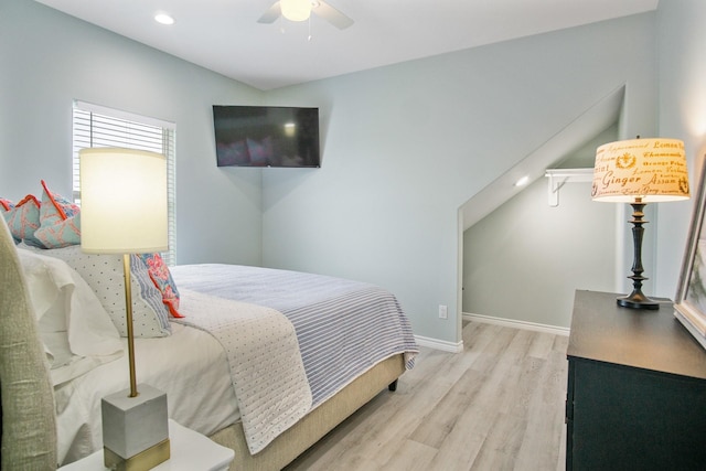 bedroom with ceiling fan and light wood-type flooring