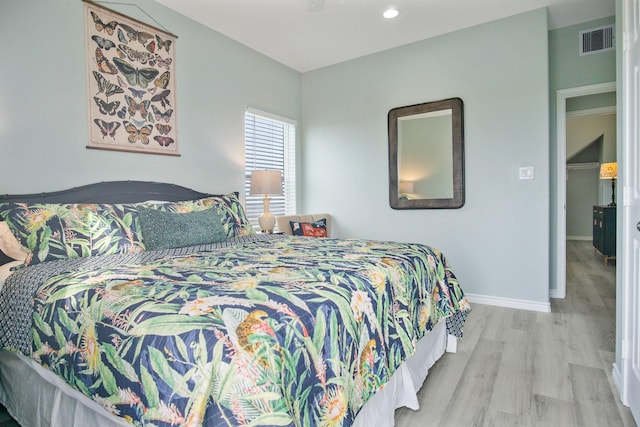 bedroom featuring light wood-type flooring