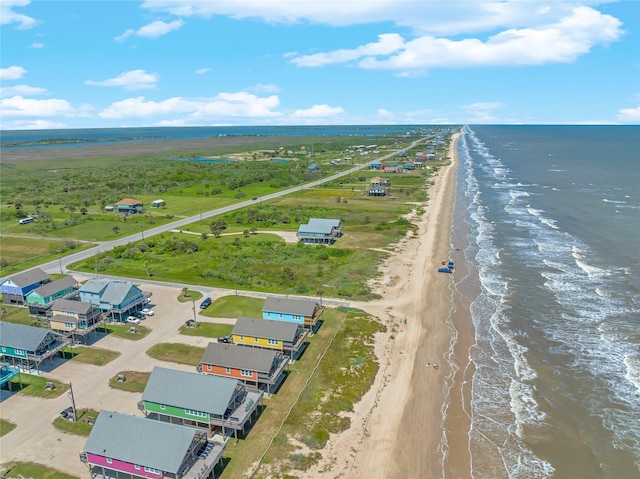 aerial view with a beach view and a water view