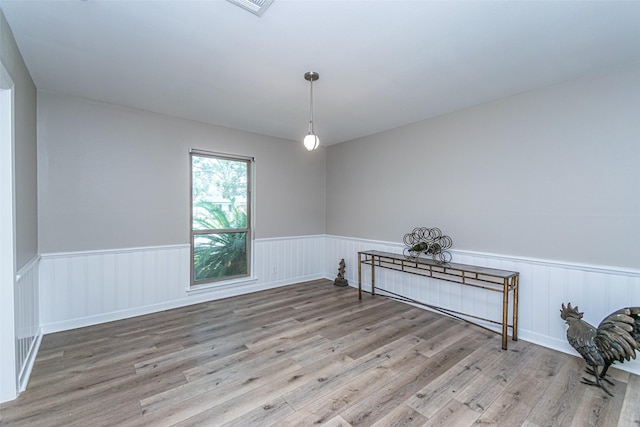 unfurnished room featuring light wood-type flooring