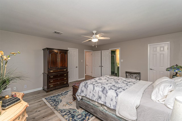 bedroom featuring ceiling fan and light wood-type flooring