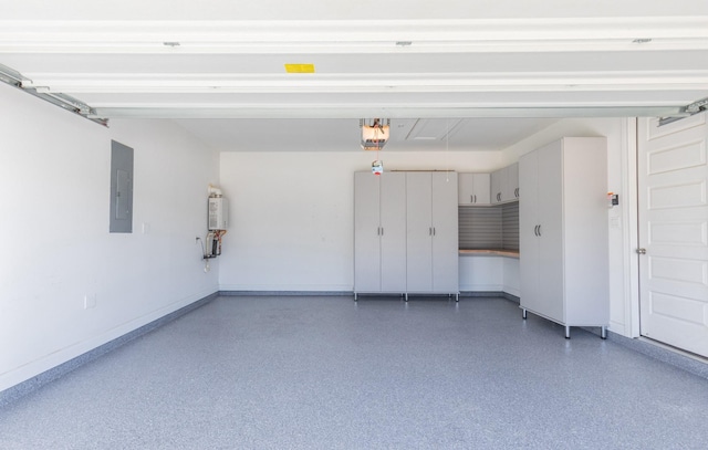 garage with a garage door opener, electric panel, and water heater