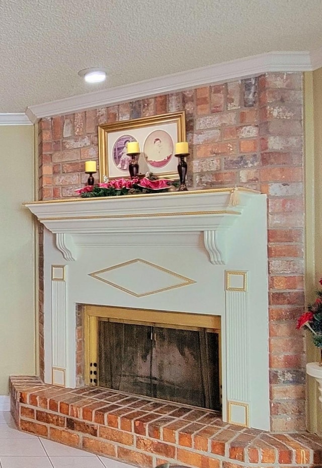 details featuring crown molding, a fireplace, and a textured ceiling