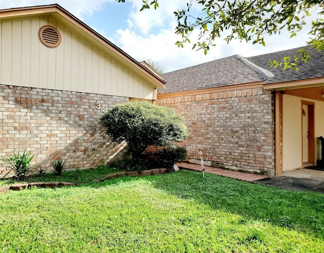 view of property exterior with a yard