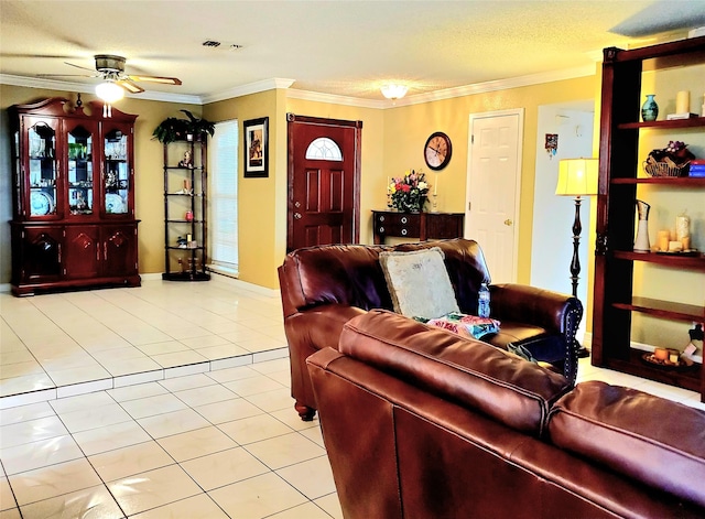 tiled living room with ceiling fan, crown molding, and a textured ceiling