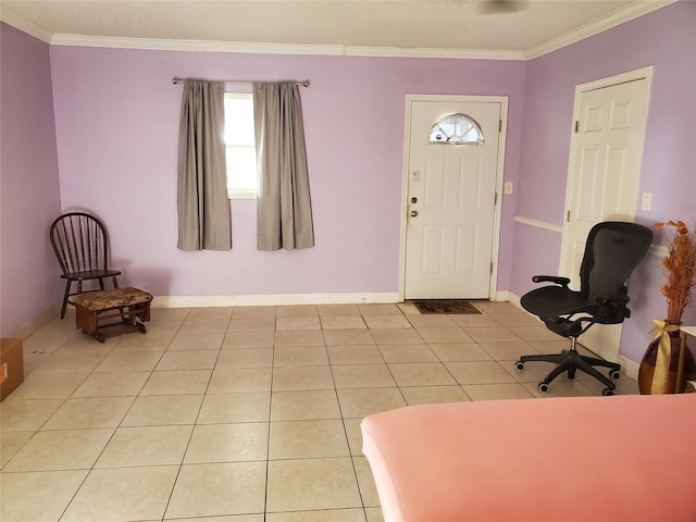 entryway featuring crown molding and light tile patterned floors