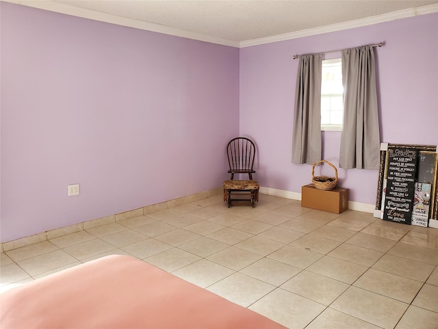 unfurnished room featuring crown molding and light tile patterned flooring