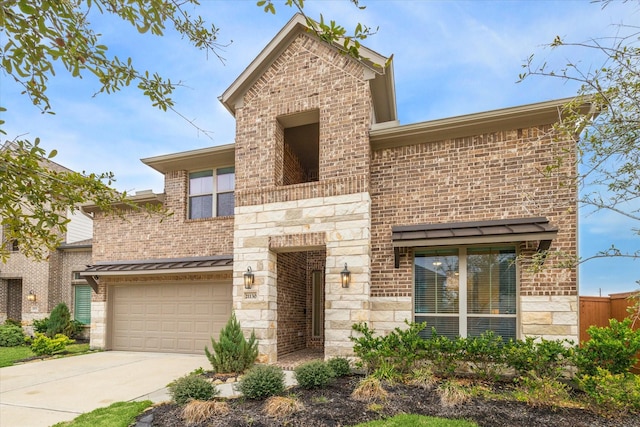 view of front of home with a garage