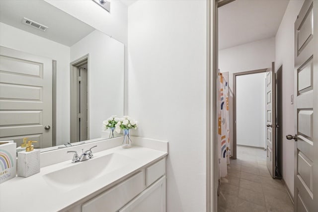 bathroom with vanity and walk in shower